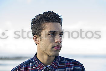 Similar – Adult man standing on beach