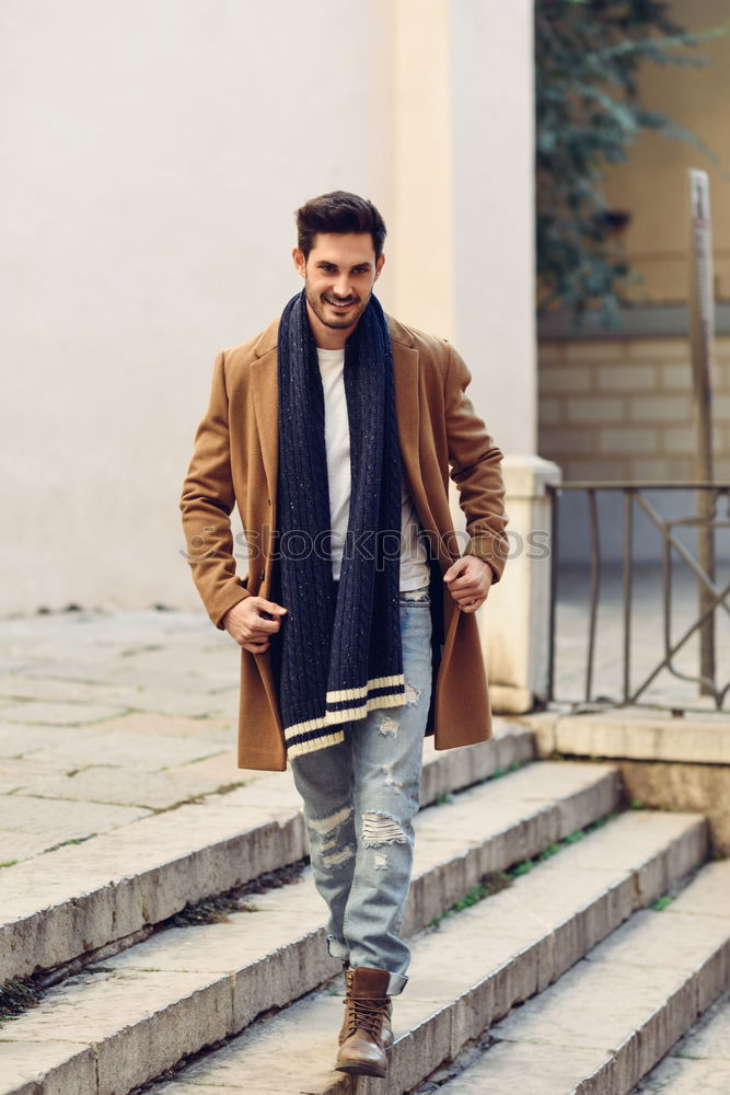 Similar – Young man wearing winter clothes in the street.