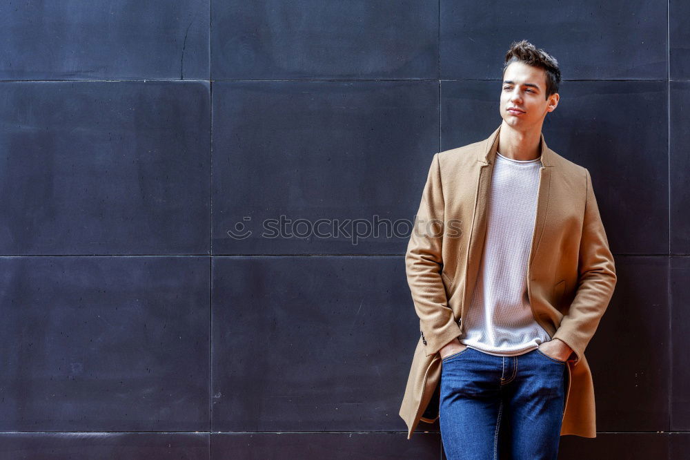 Image, Stock Photo Young man wearing winter clothes standing in the street