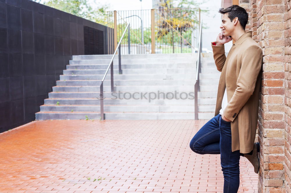 Image, Stock Photo Modern young man with mobile phone in the street.