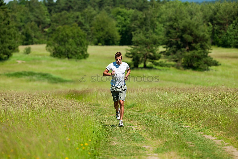 Similar – Senior Man Running in the Forest