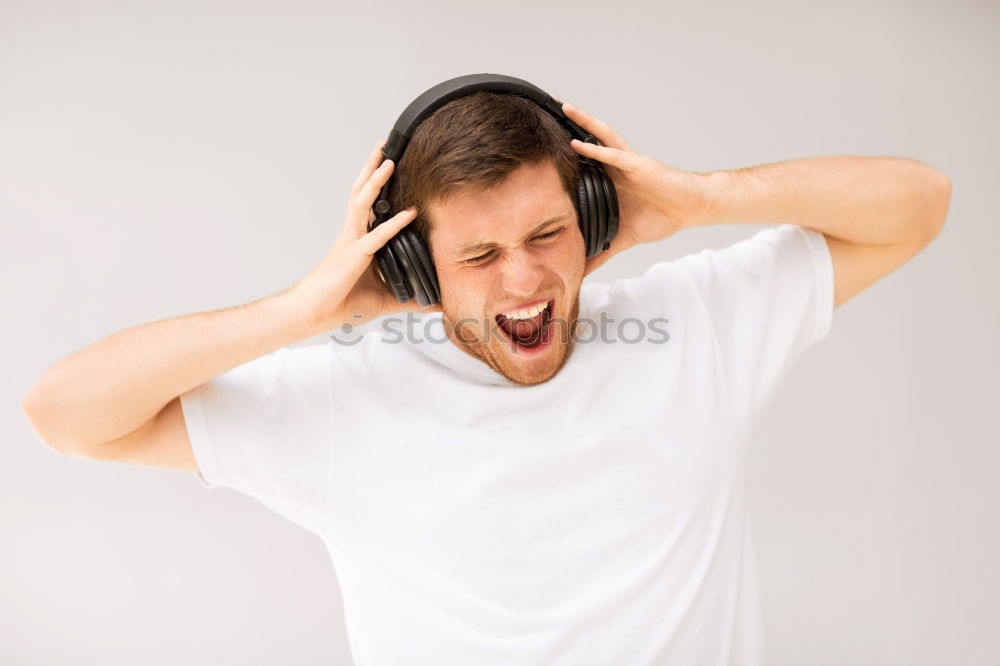 Similar – portrait of a Screaming little boy covering ears with hands