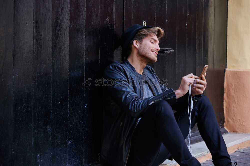 Similar – Afro young man using mobile phone and fixed gear bicycle.