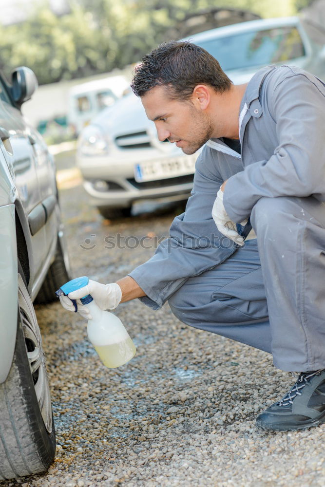 Similar – Image, Stock Photo Man worker washing car with sponge