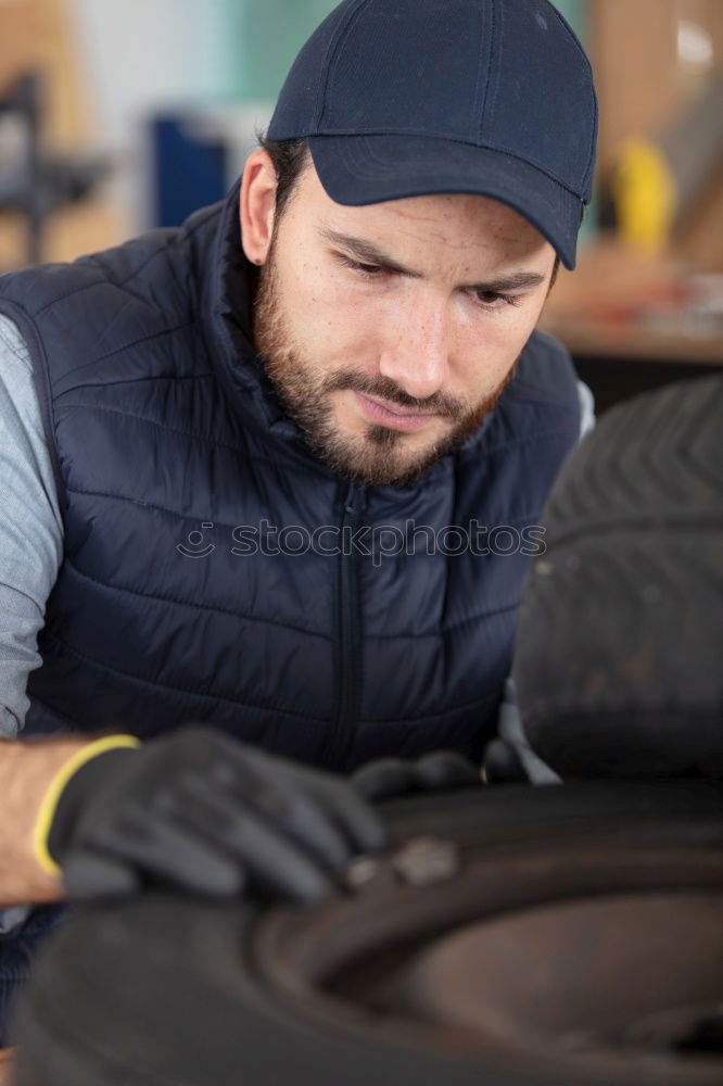 Similar – Professional Car Mechanic working.