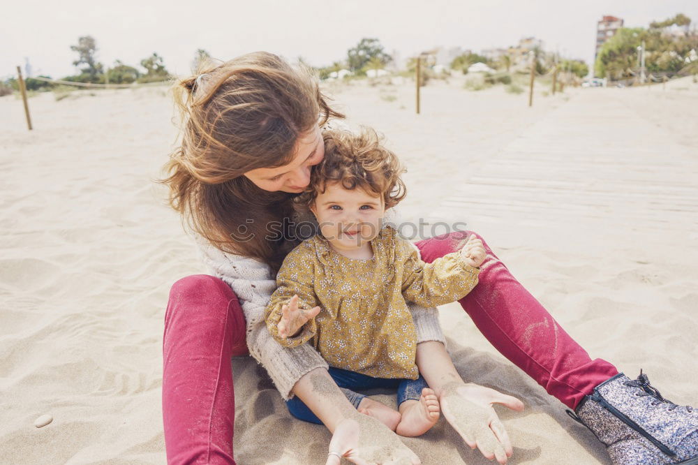 Similar – Image, Stock Photo caucasian mother having his son on her back at the beach