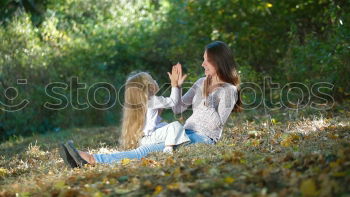 Similar – happy mother and daughter on the walk on summer