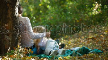 Similar – Young redhead hippie woman resting in nature