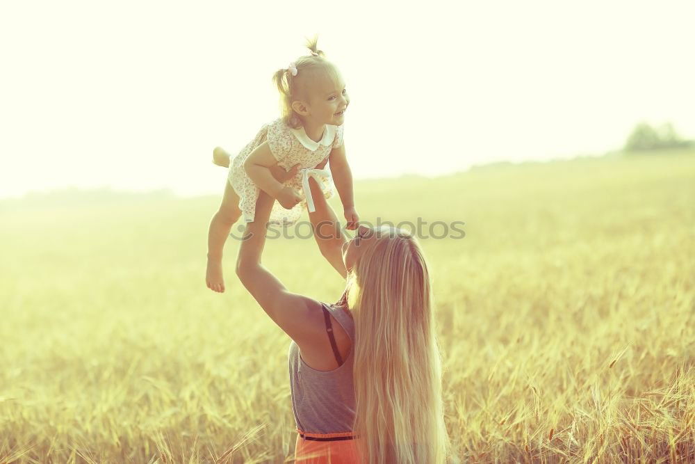 Similar – Father and son playing on the beach at the day time. Concept of friendly family.