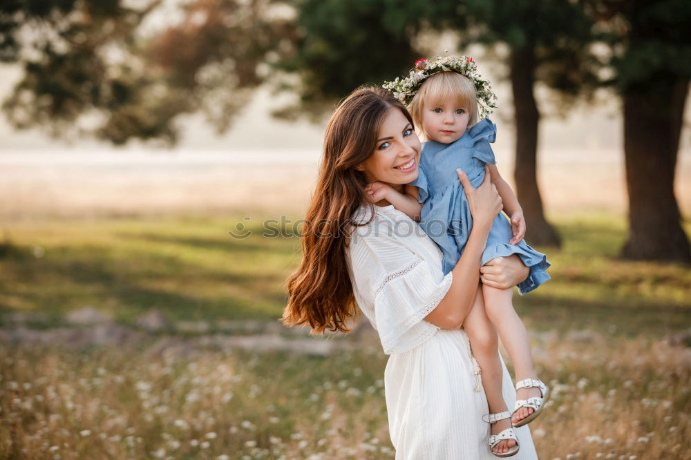 Similar – Image, Stock Photo Mother with child in park
