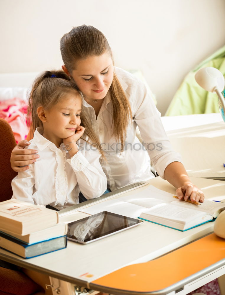 Similar – Image, Stock Photo Mother and her child with digital tablet.