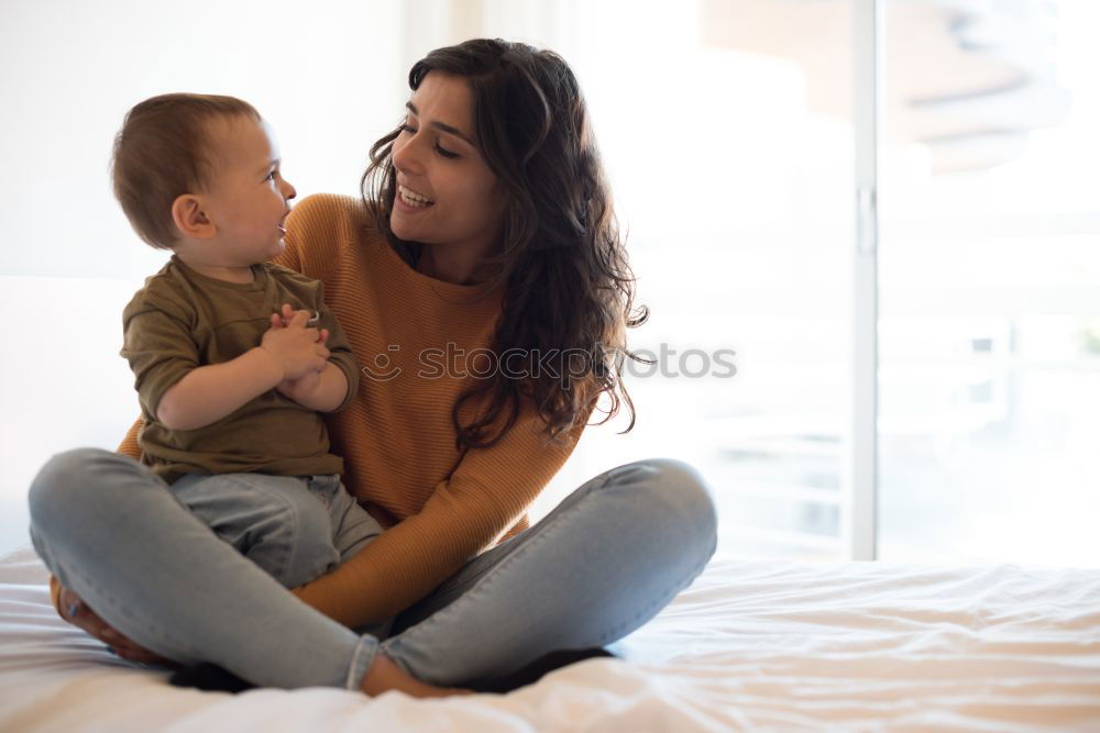 Similar – indoor portrait of happy mother and child son