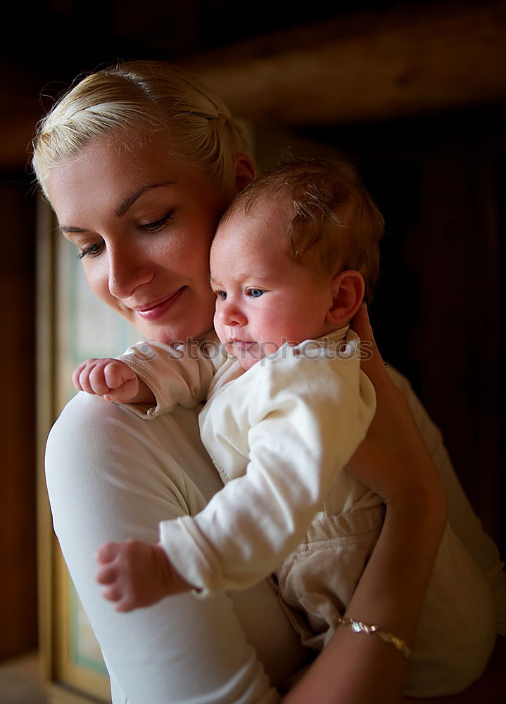 Similar – Happy lesbian couple with child