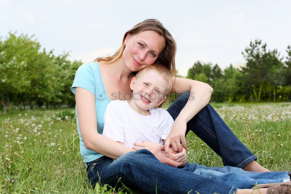 Similar – Grandma has her grandson on her arm