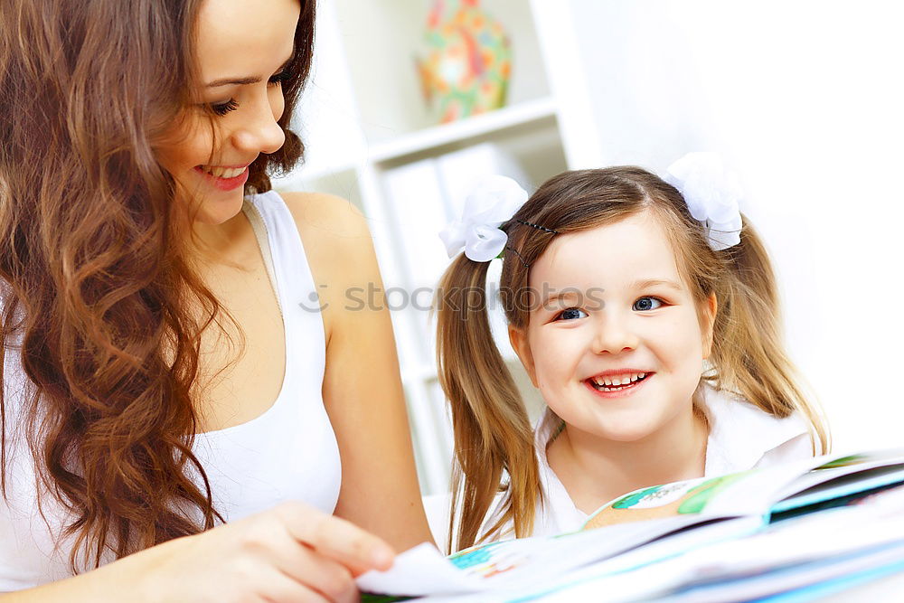 Similar – mother brushing toddler daughter’s hair