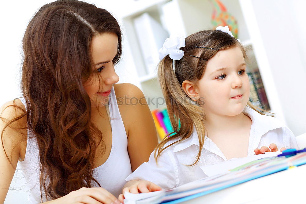 Similar – Image, Stock Photo Mom with little daughter drawing the colorful pictures