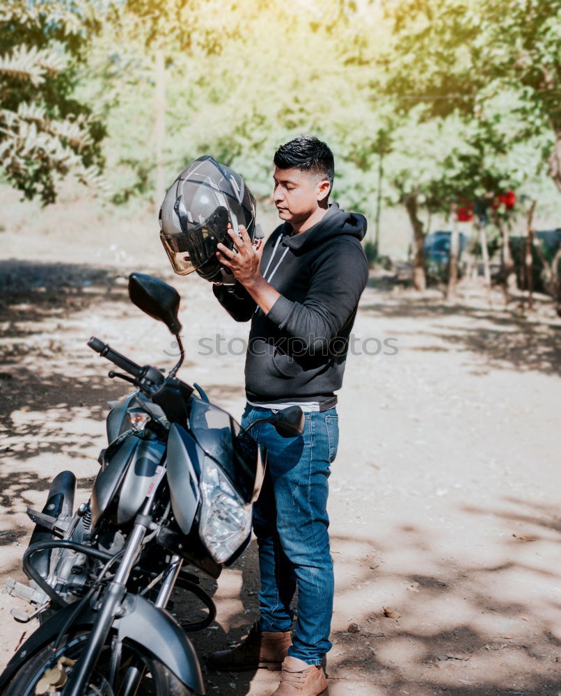 Similar – Woman with helmet riding custom motorbike