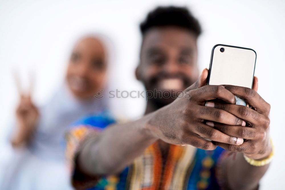 Similar – Image, Stock Photo American man using mobile in the street.