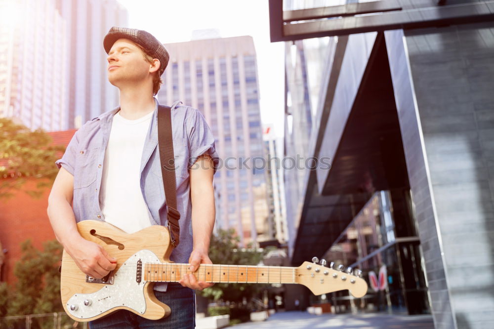 Similar – Image, Stock Photo outdoor photo session with a bass player and his instruments