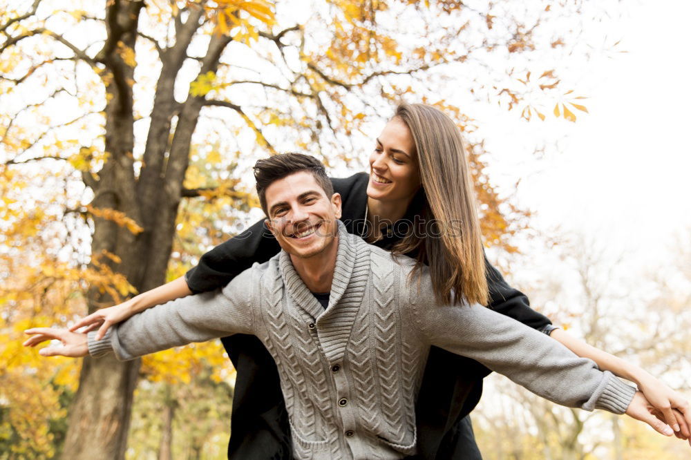 Similar – Romantic Young Couple Walking in the City.