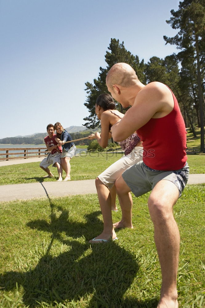 Similar – Slackline at the lake Joy