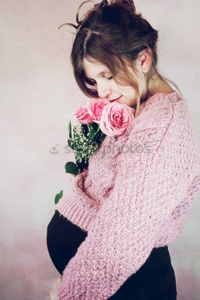 Similar – Young woman hugging a bouquet of flowers