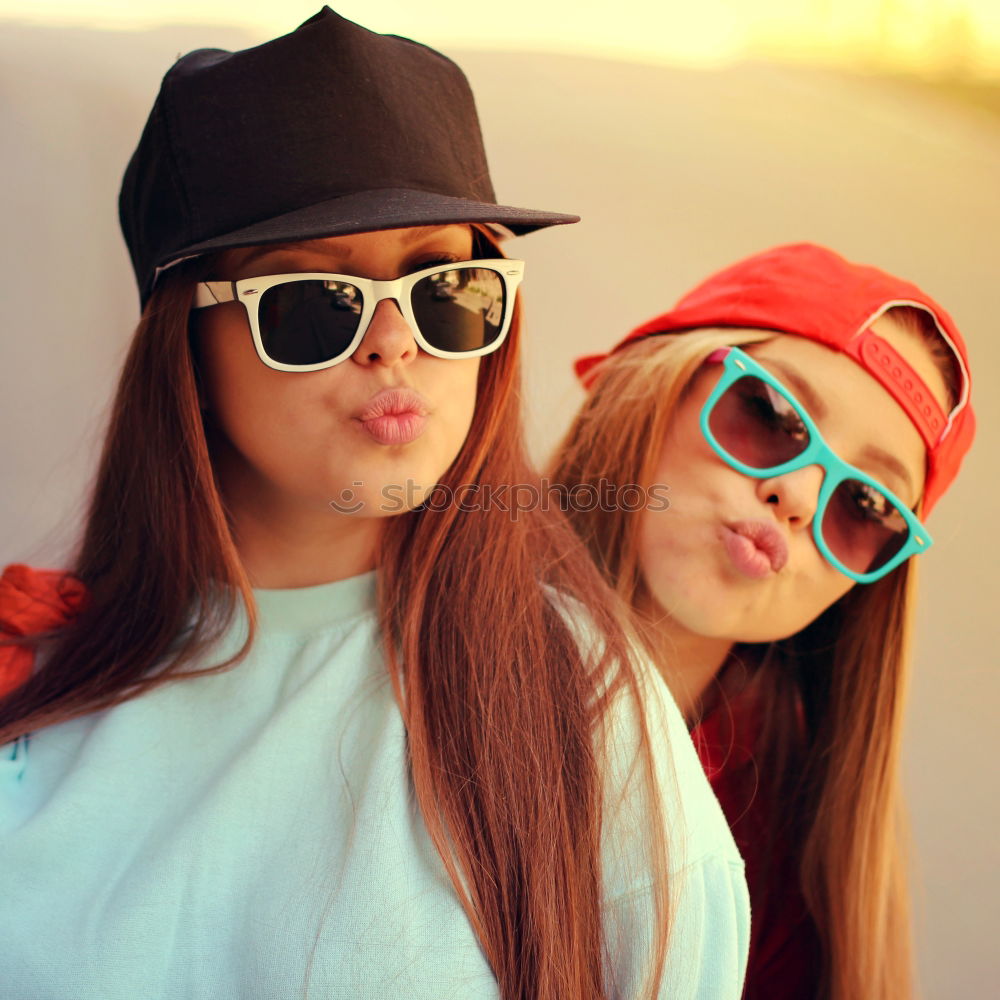 Similar – Image, Stock Photo Two girls sitting on the bench and smile