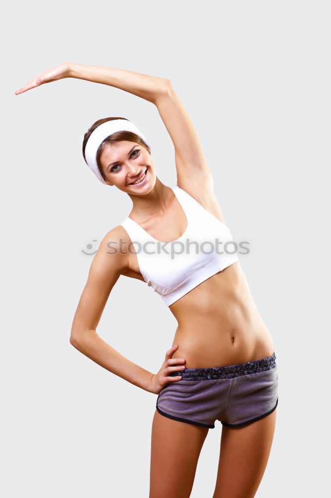 Young woman doing stretching exercises