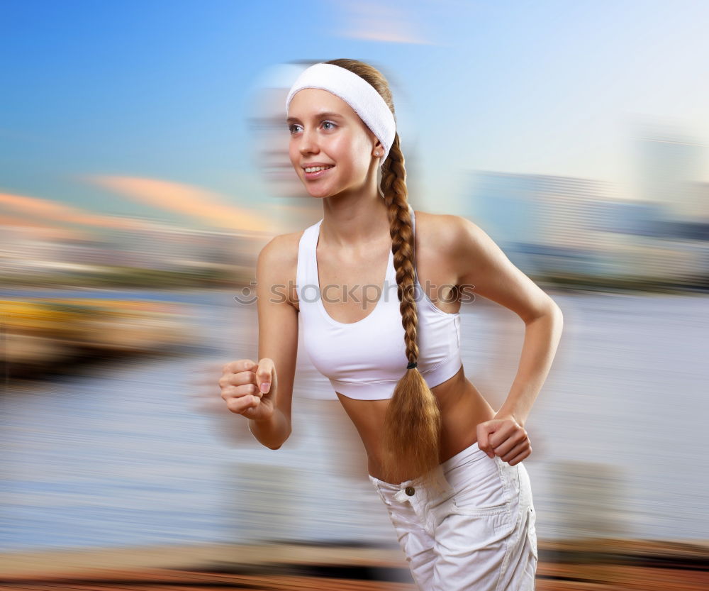 Similar – Young Woman working out outdoors and having fun