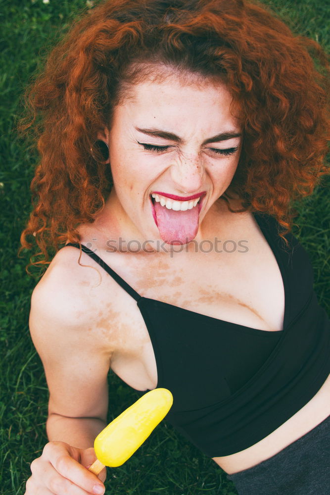 Similar – Cheerful brunette woman lying in grass