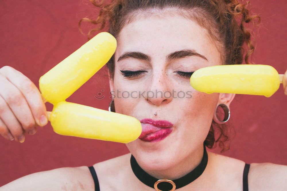 Image, Stock Photo Young woman eating lemon ice creams