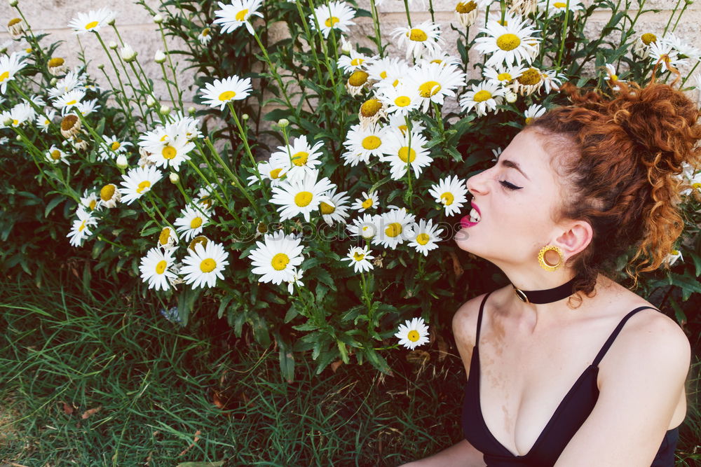 Similar – Image, Stock Photo Beautiful redhead woman surrounded by flowers in spring