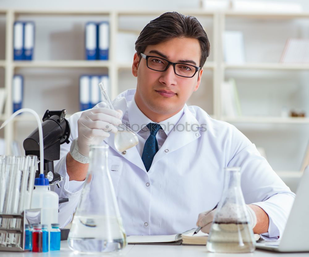 Similar – Image, Stock Photo Young man in lab
