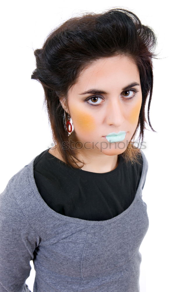 Similar – portrait of young woman eating bubble gum in brick background