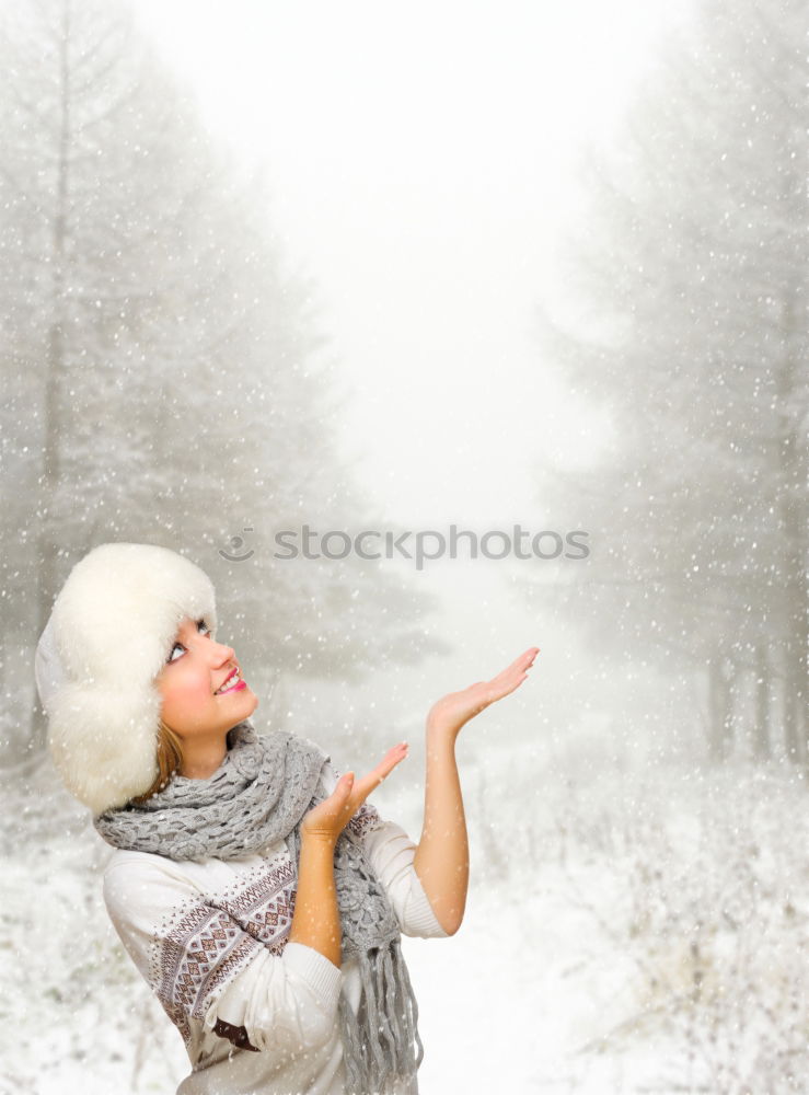 Similar – Image, Stock Photo Young and pretty woman enjoying a snowy winter day