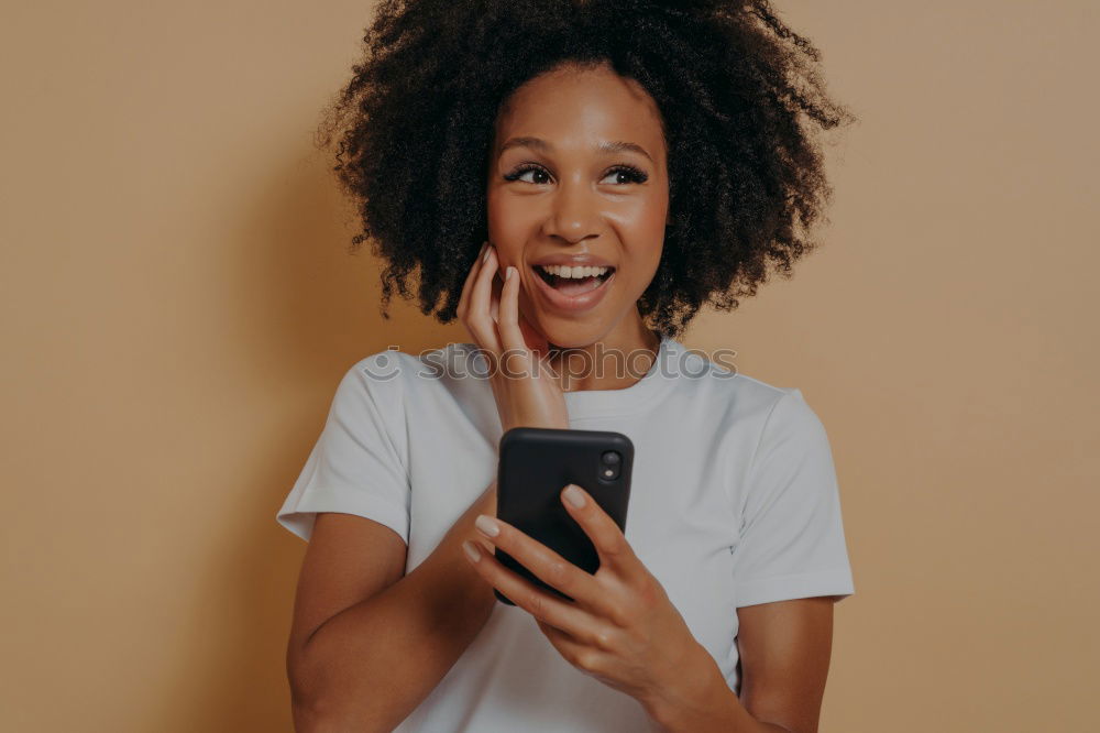 Similar – Image, Stock Photo Young adult woman typing message on smart phone in cafe