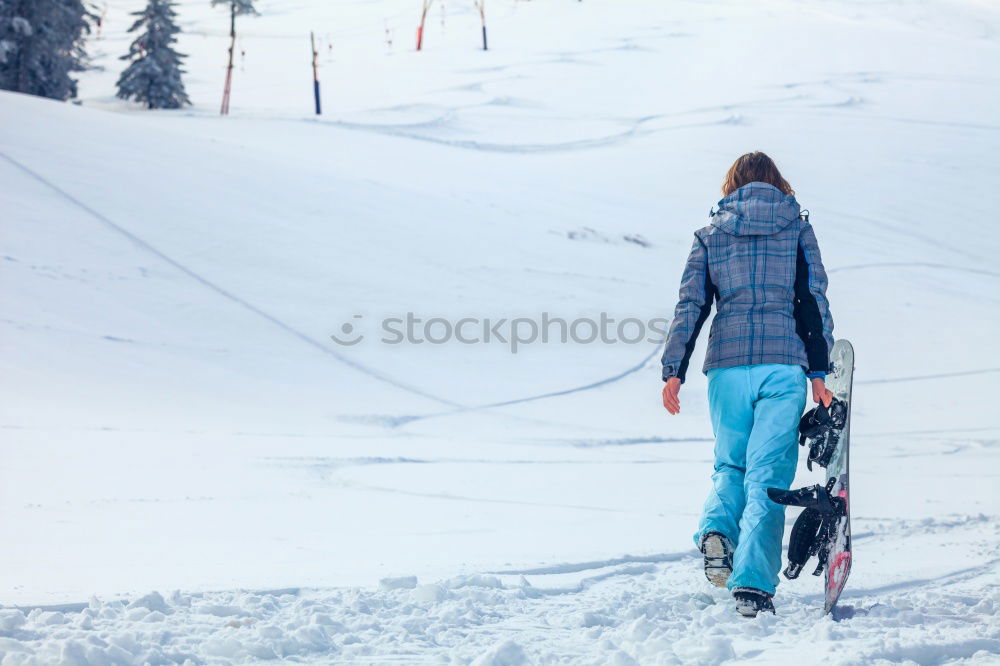 Similar – Image, Stock Photo WEB banner format. Two frends snowboarders are walking through the winter forest. Snowboarding in the forest in the mountains. Backcoutry or freeride style. Life style.