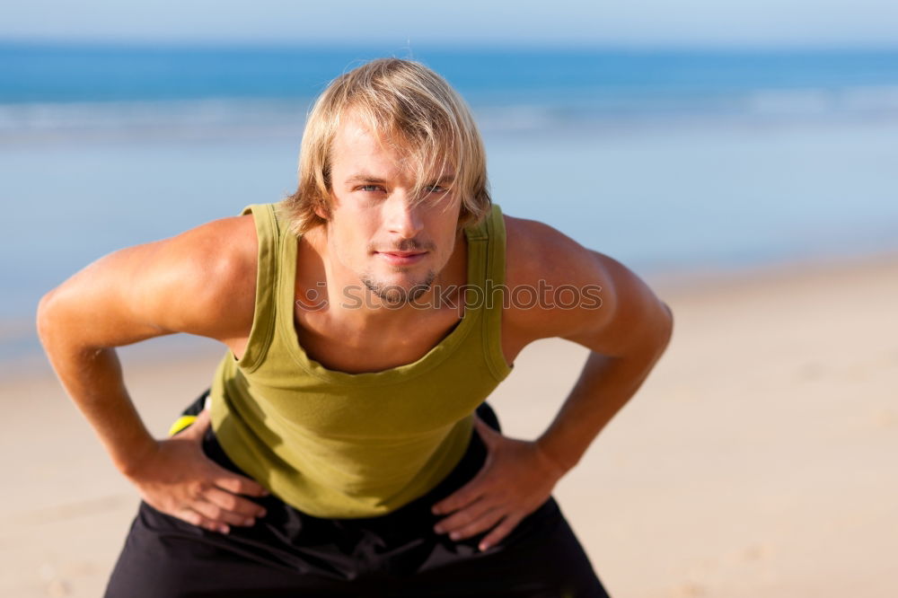 Similar – handsome swimmer putting on goggles