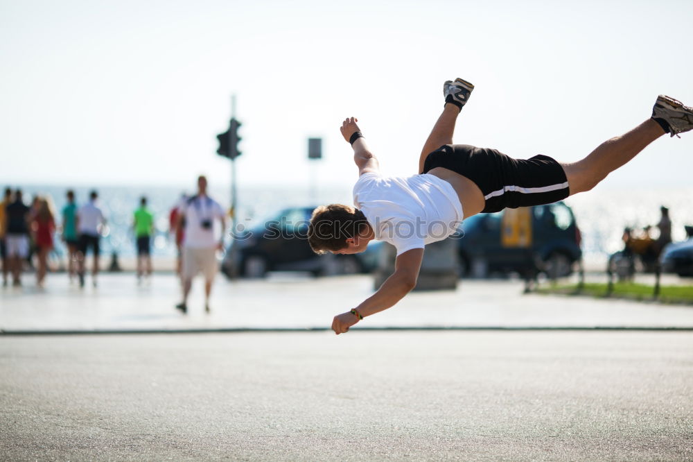 Similar – Image, Stock Photo Strong white woman jumping in the air during contemporary dance performing.