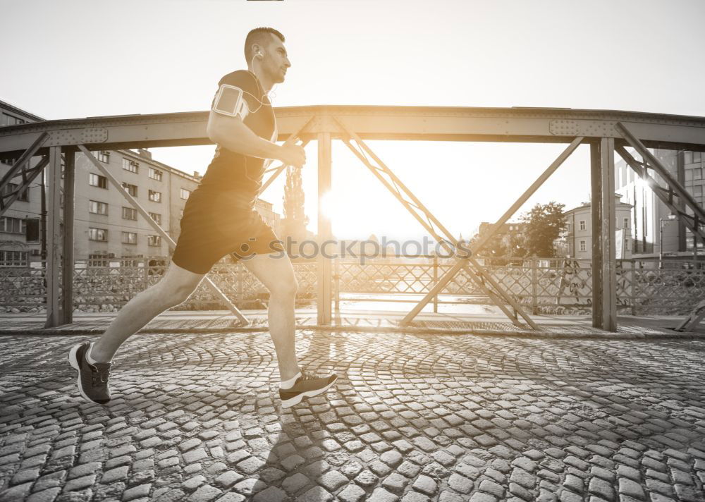 Similar – Rear view of black man running in urban background.