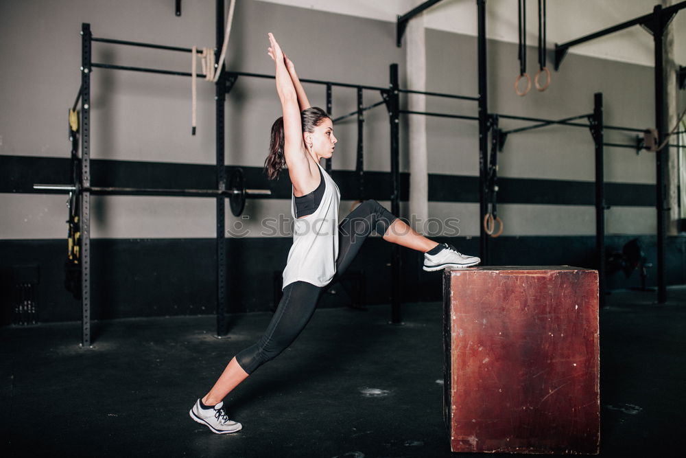 Similar – Image, Stock Photo Women training chins in gym in back image