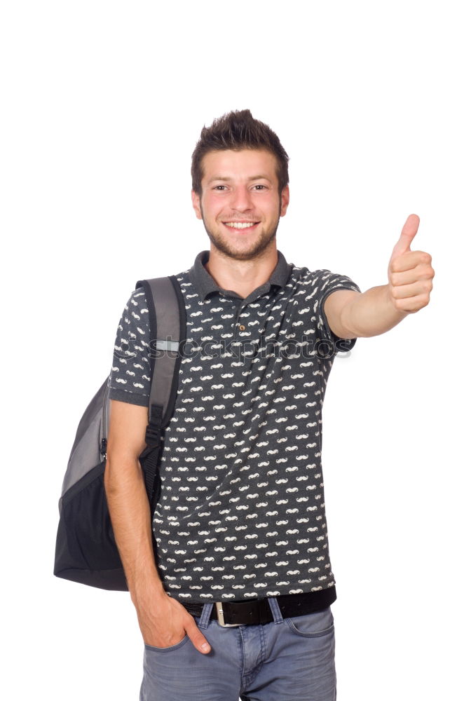 Similar – Young urban man using smartphone walking in street in an urban park