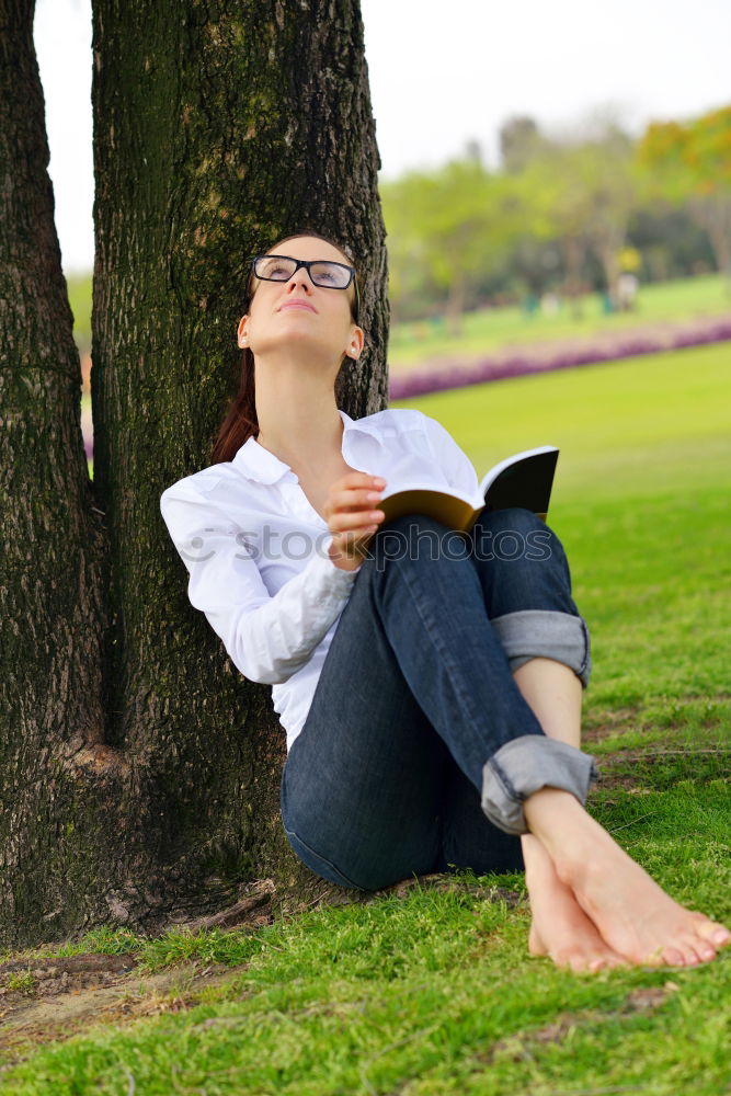 Similar – Image, Stock Photo Girl siting under the tree, reading the book