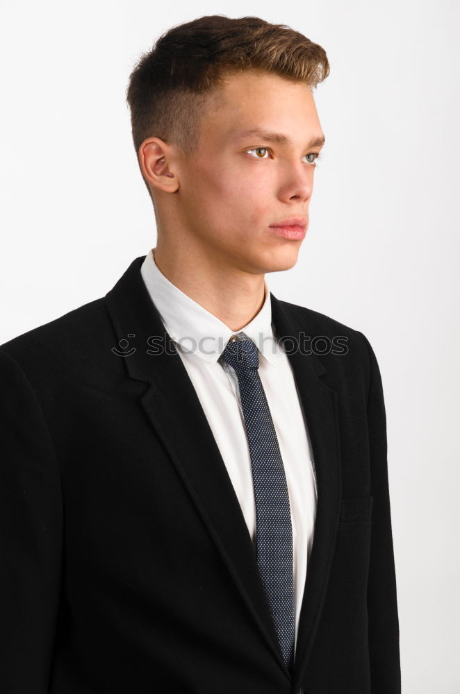 Similar – Businessman in urban background wearing blue suit