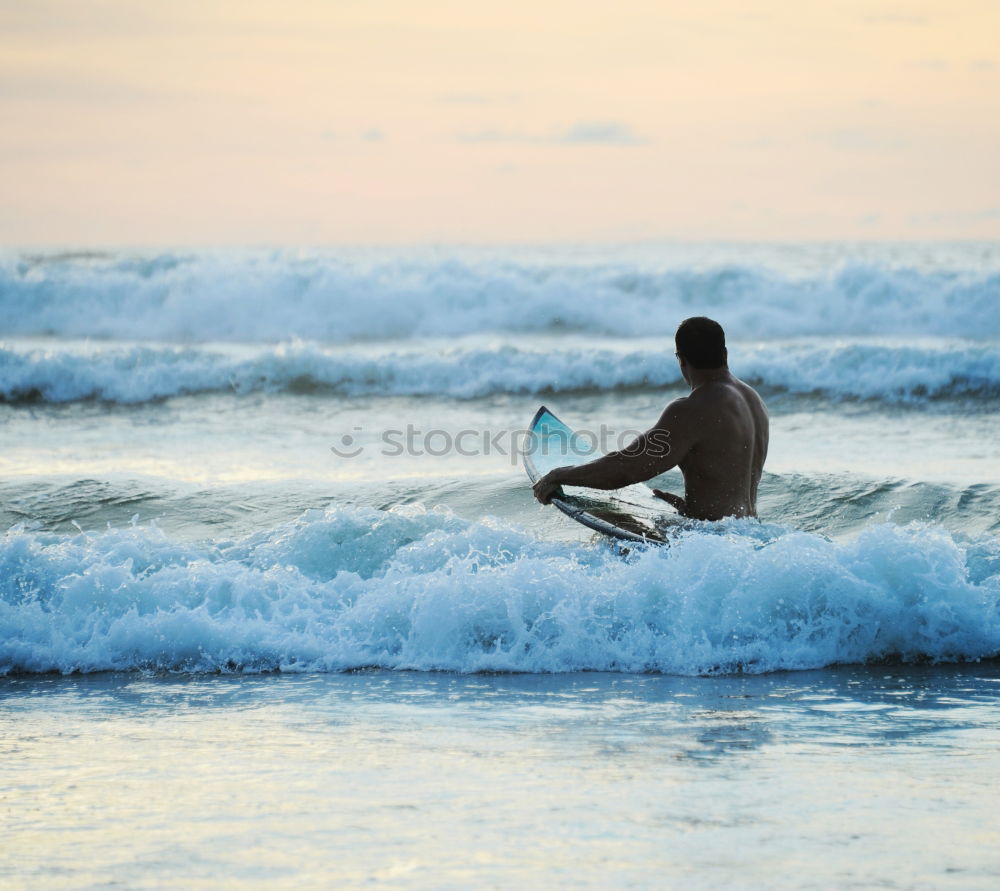 Similar – Out there. Ocean Surfer