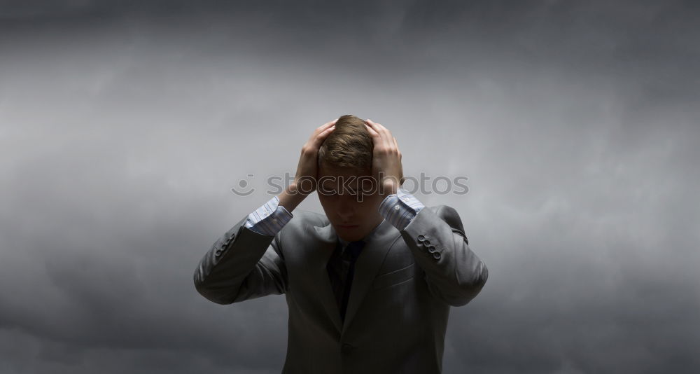 Similar – Man exhausted from a hike at a viewpoint