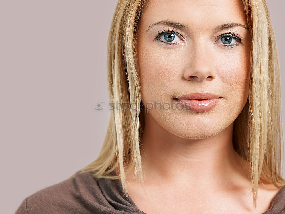 Similar – Image, Stock Photo Young woman with freckles and short blonde hair looks sideways at camera