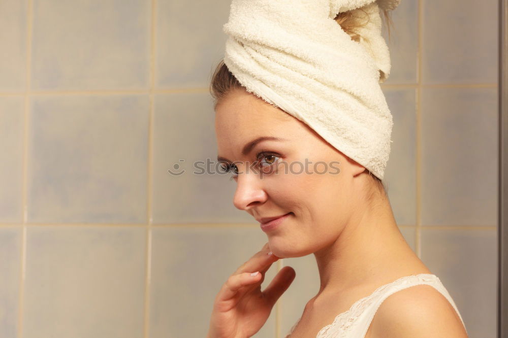 Similar – Playful mischievous woman with wet hair in a towel