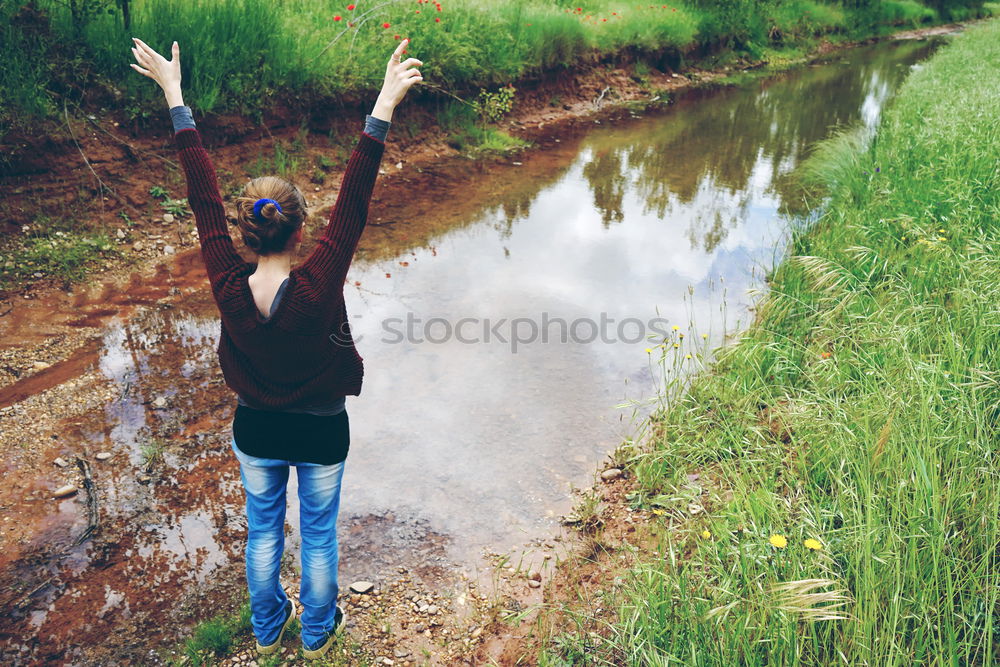 Similar – Image, Stock Photo Hello snowflake. Beautiful girl catching a single snowflake at a snowy winter scene.