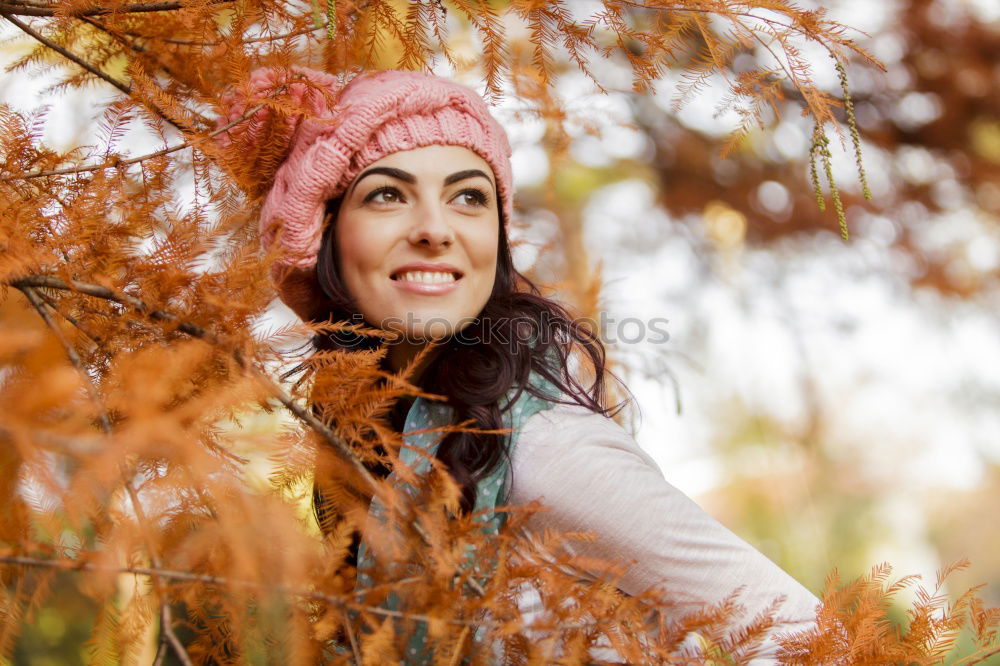 Similar – Matured woman with pink wool hat in the forest